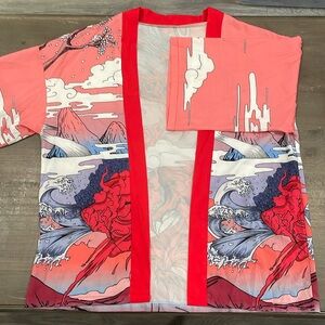 Woman’s Short Kimono robe with red dragon. Size small made out of 100% polyester